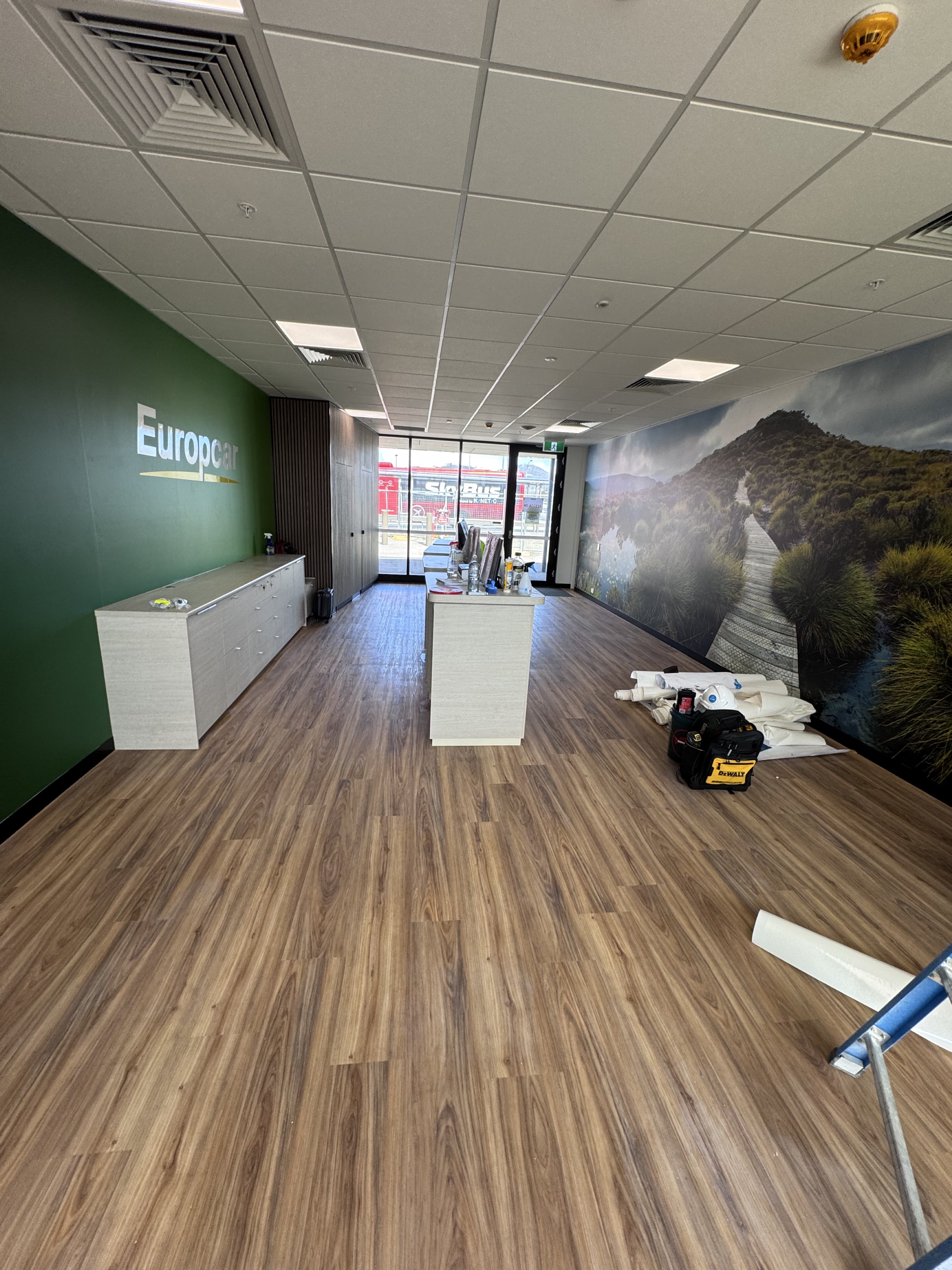 Europcar Hobart fitout with counters and wall mural